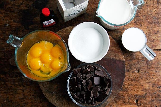 Ingredients for making stovetop pot de creme on a table. 