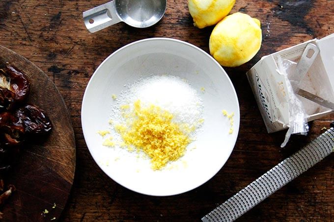 A bowl of lemon zest and coconut. 