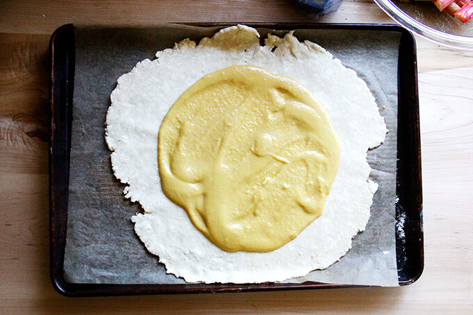 Frangipane spread onto rolled out pastry dough. 