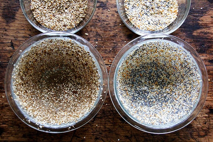 buttered pyrex bowls coated in seeds 