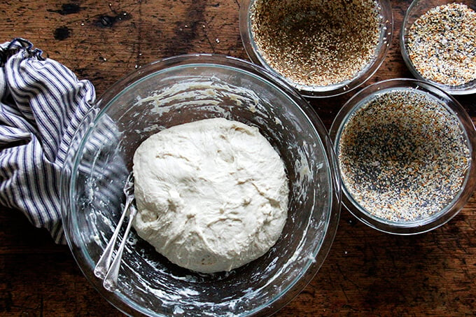 A bowl of punched down bread dough. 