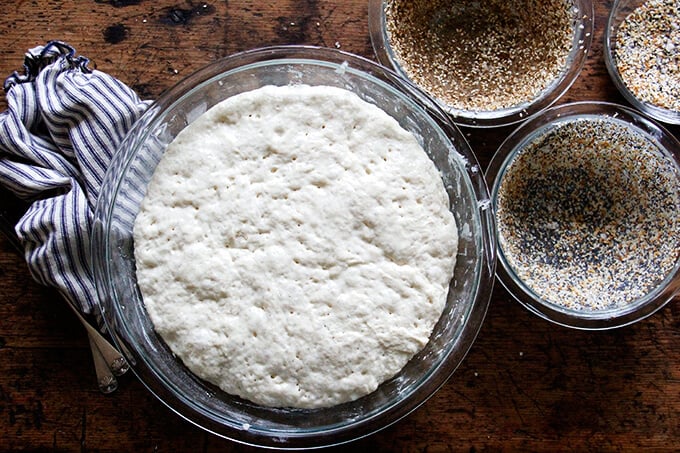 A bowl of risen bread dough. 