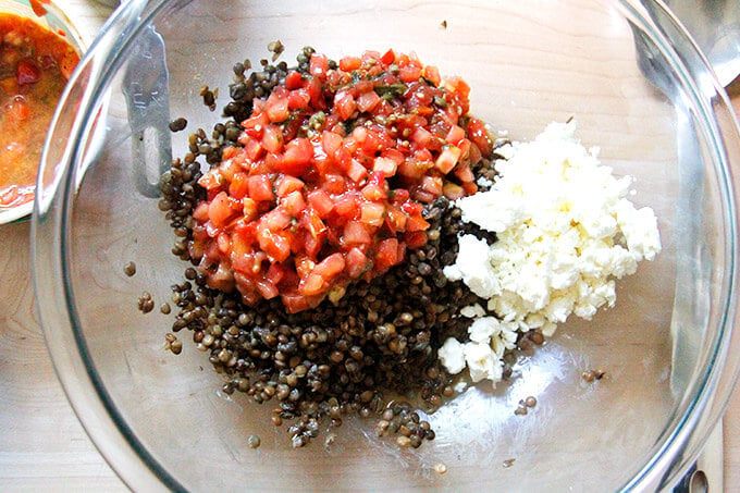 Bowl of lentils, bruschetta sauce, and feta. 