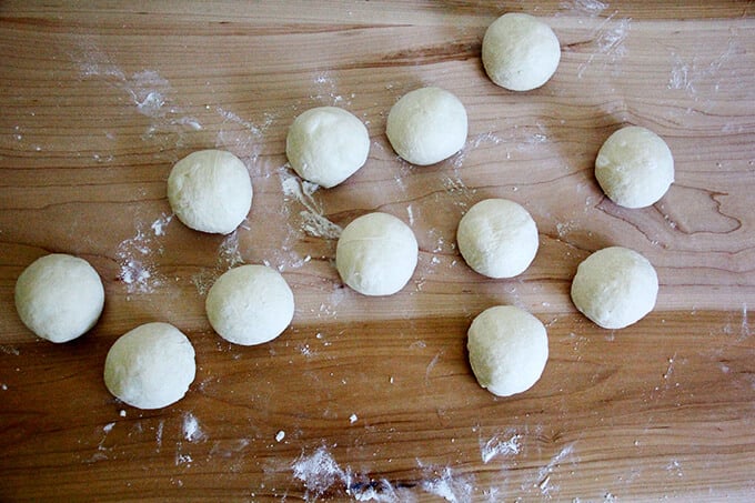 Bagel dough portions balled up. 