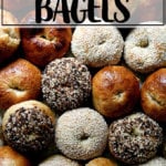 A sheet pan filled with freshly baked bagels.