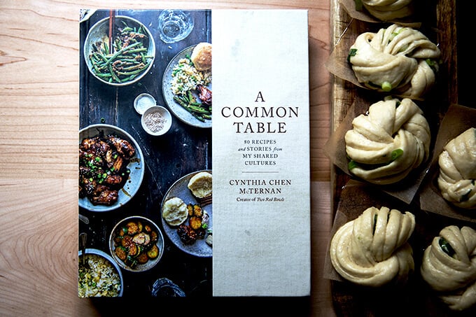 Cynthia McTernan's A Common Table next to un-steamed scallion buns.