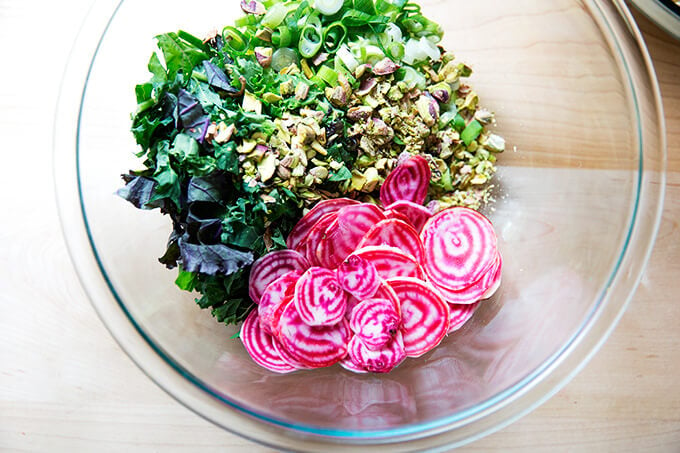 A large bowl filled with the ingredients for Charlie Bird farro salad.