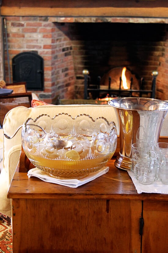 A punch bowl filled with Philadelphia Fish House Punch on a chest.