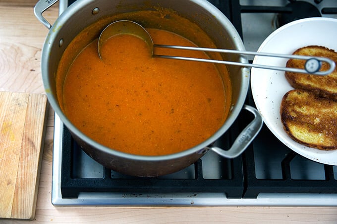 Carrot-saffron soup puréed and ready to eat with olive oil toasted bread. 