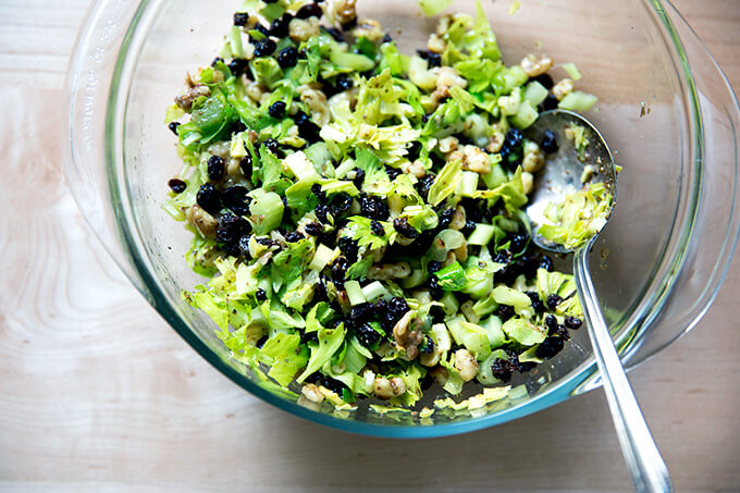 A large bowl filled with celery-walnut salsa.