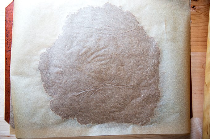 Rolled dough for Stamped spiced brown butter muscovado cookies with maple glaze .