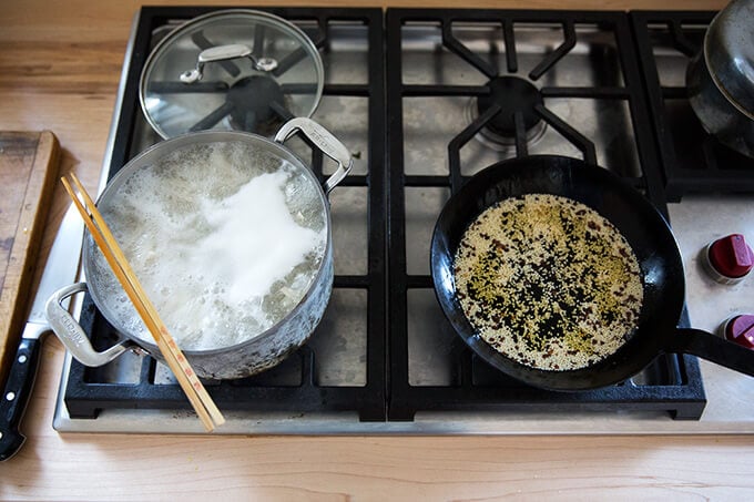 How to make Chinese noodles with chilies, scallions, and cabbage.