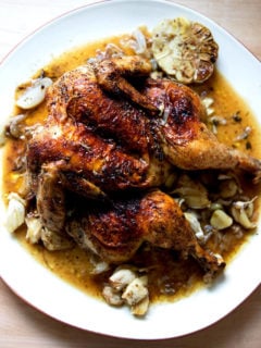 A plate of Dorie Greenspan's oven-roasted spatchcocked chicken with za'atar and lemon.