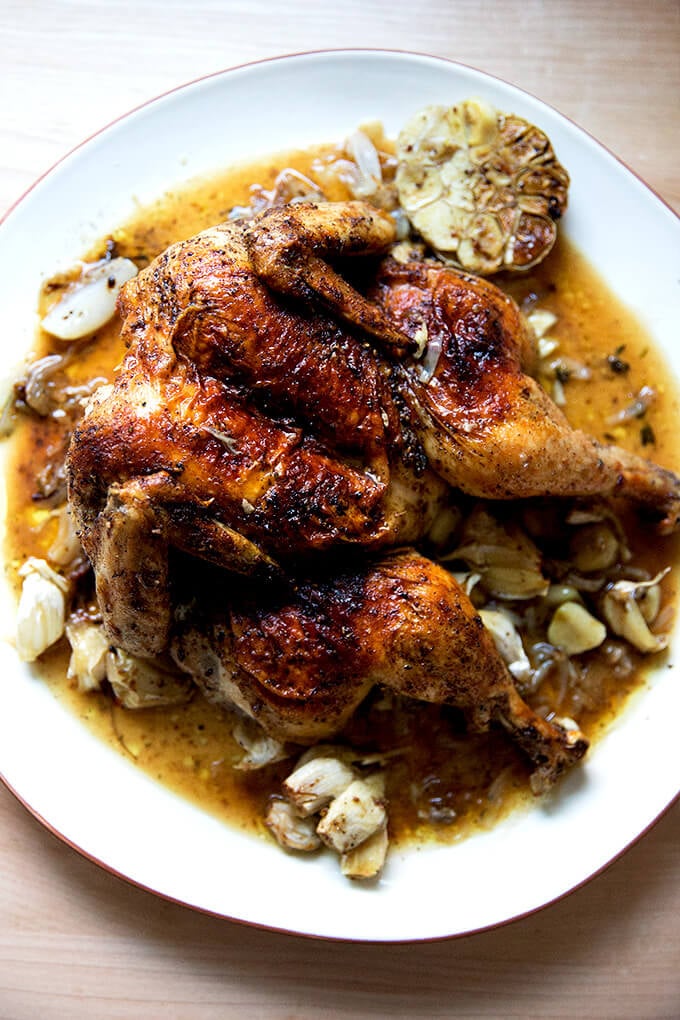 A plate of Dorie Greenspan's oven-roasted spatchcocked chicken with za'atar and lemon.