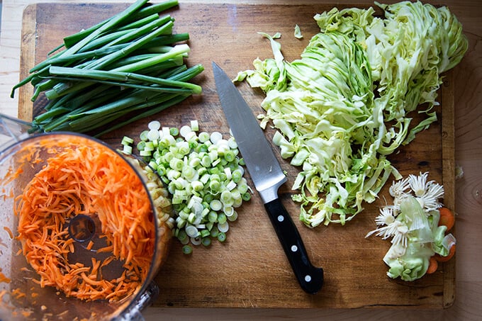 How to make Chinese noodles with chilies, scallions, and cabbage.