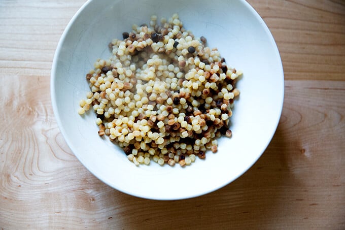 A bowl filled with just-cooked fregola. 