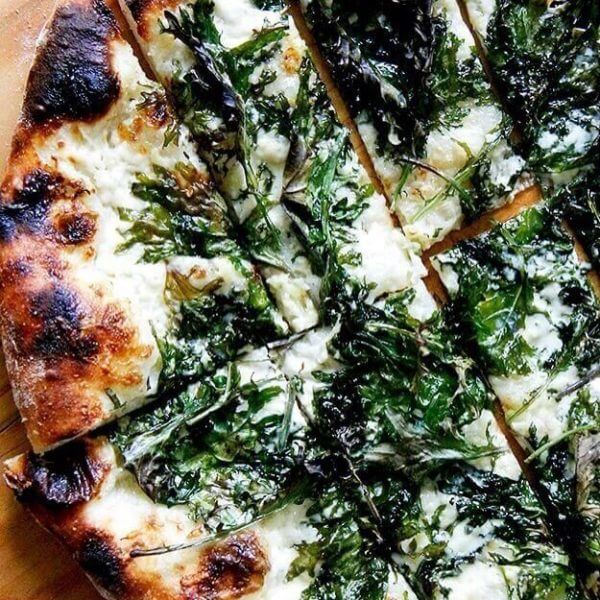 pizza with kale and crème fraîche