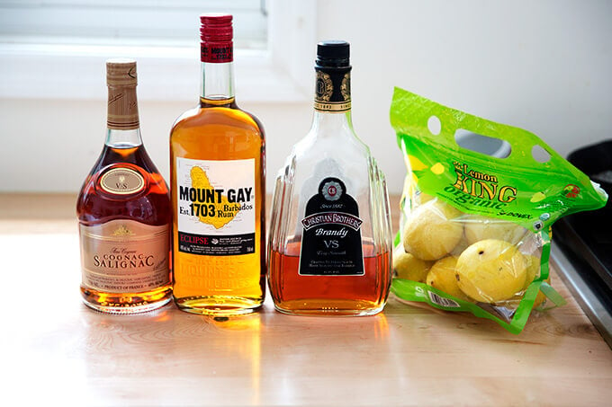 Ingredients for Philadelphia Fish House Punch on a countertop. 