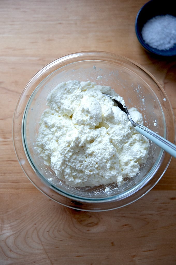 Homemade ricotta in a bowl.