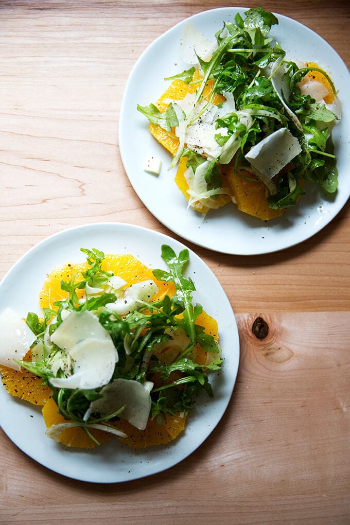 two plates or orange-arugula salad