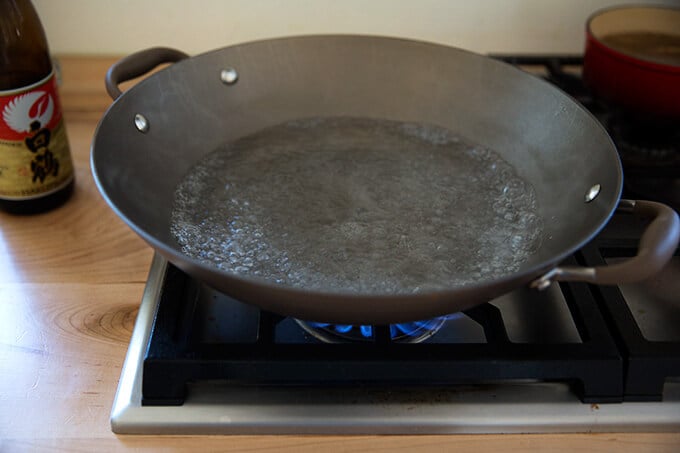 boiling water in the wok