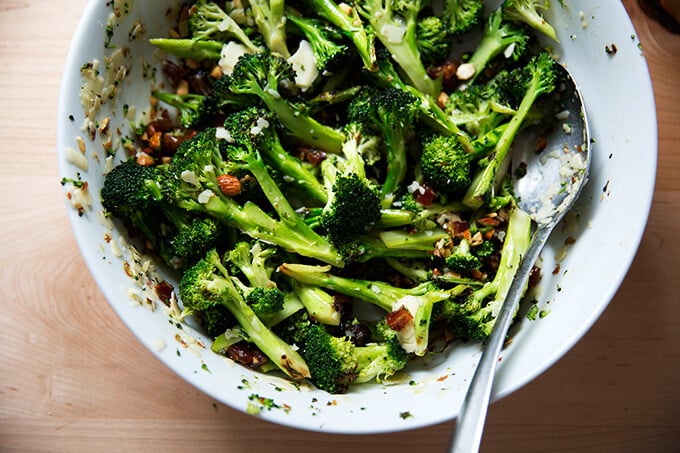 charred broccoli salad with dates, almonds, and cheddar