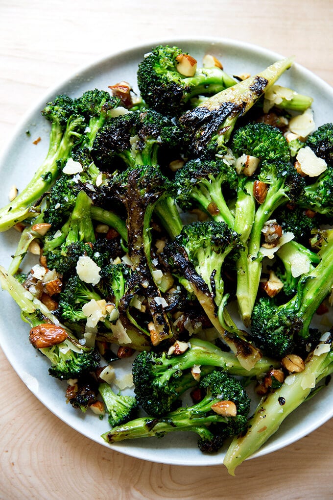 charred broccoli salad with dates, almonds, and cheddar