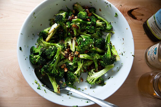 dates and almonds tossed with broccoli