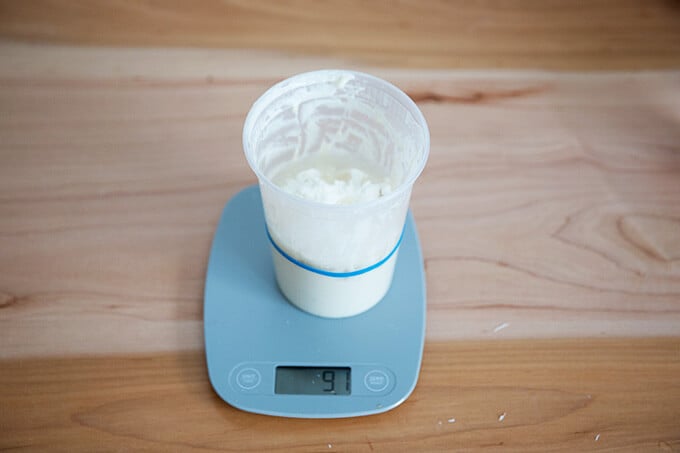 feeding the sourdough starter with water