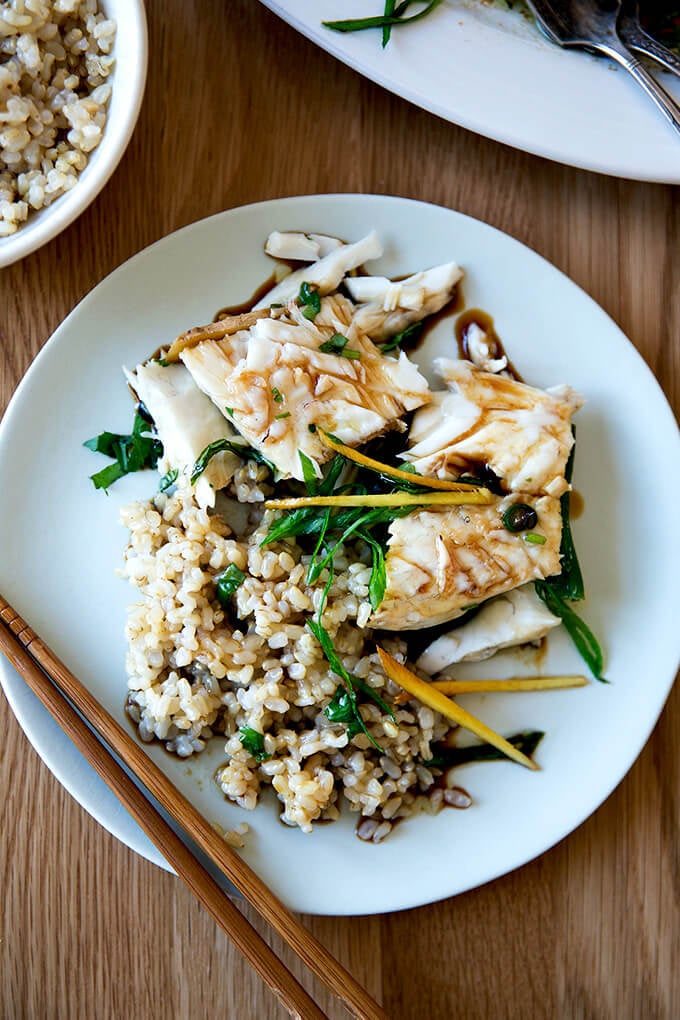 plate of Chinese-style steamed Branzino with brown rice