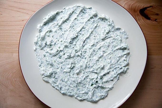 plate smeared with lemon-yogurt-parsley sauce