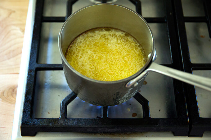A sauce pan with butter bubbling and beginning to brown.