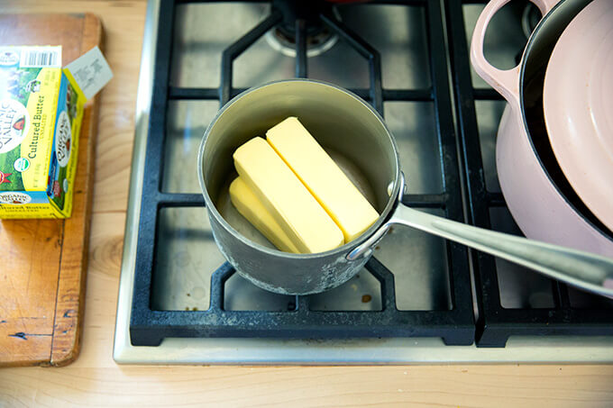 A small sauce pan filled with a pound of butter in preparation to make ghee.