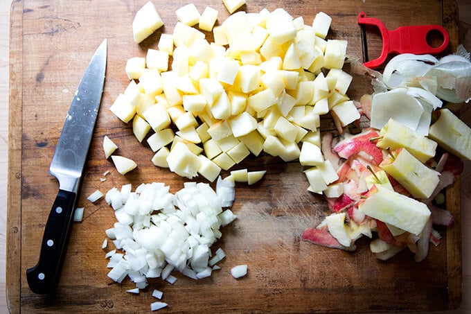 Chopped apples and onions for a homemade apple chutney recipe.