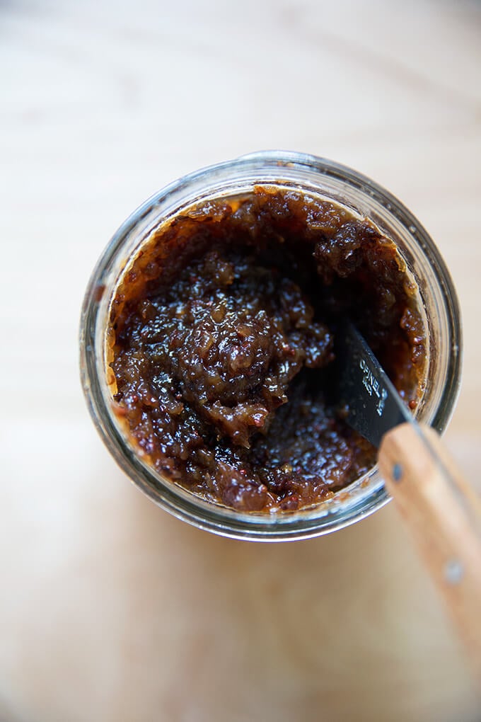 Homemade apple chutney recipe in a glass mason jar.