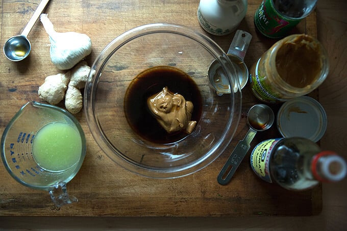 Making the chopped Thai salad satay dressing.