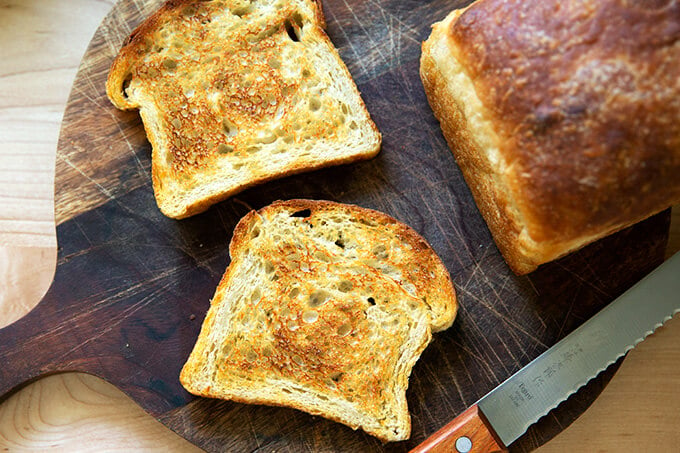 Two slices of sourdough bread, toasted.