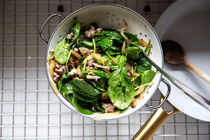 Sausage, onions, spinach all tossed together.