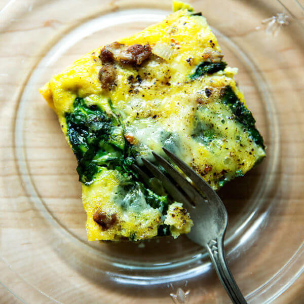 slice of sausage, spinach and egg casserole