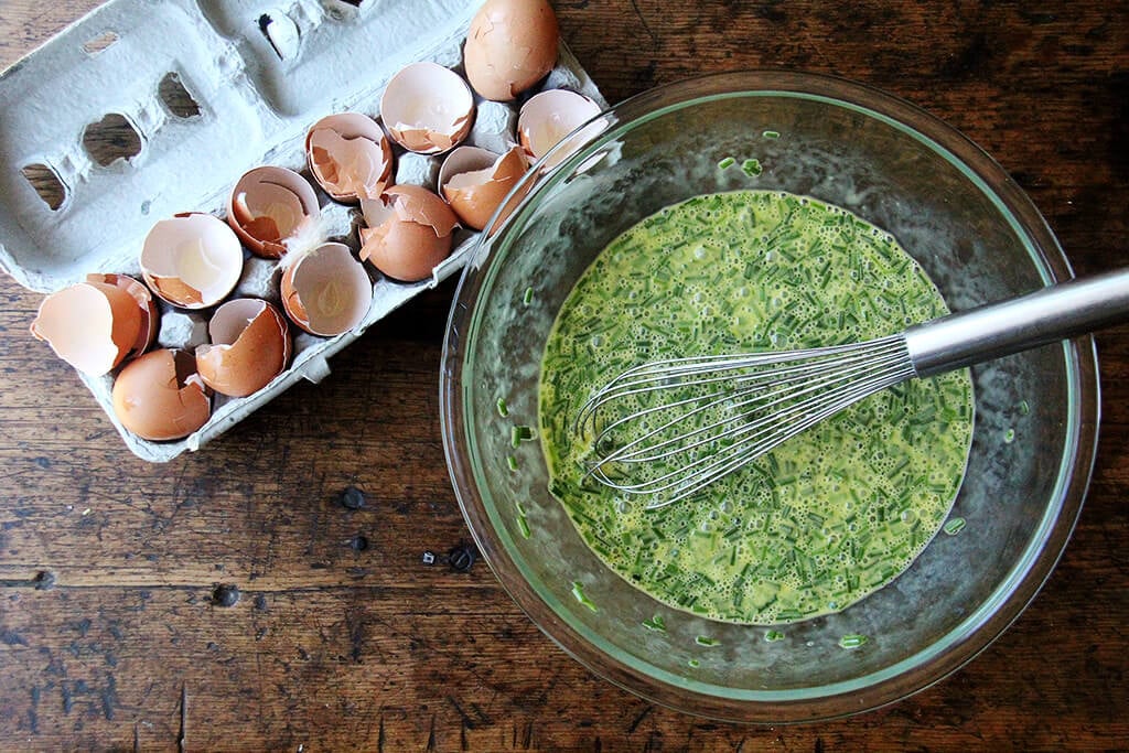 12 eggs, whisked with herbs