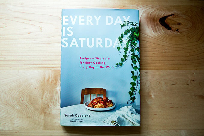 Every Day is Saturday, a cookbook, resting on the counter.