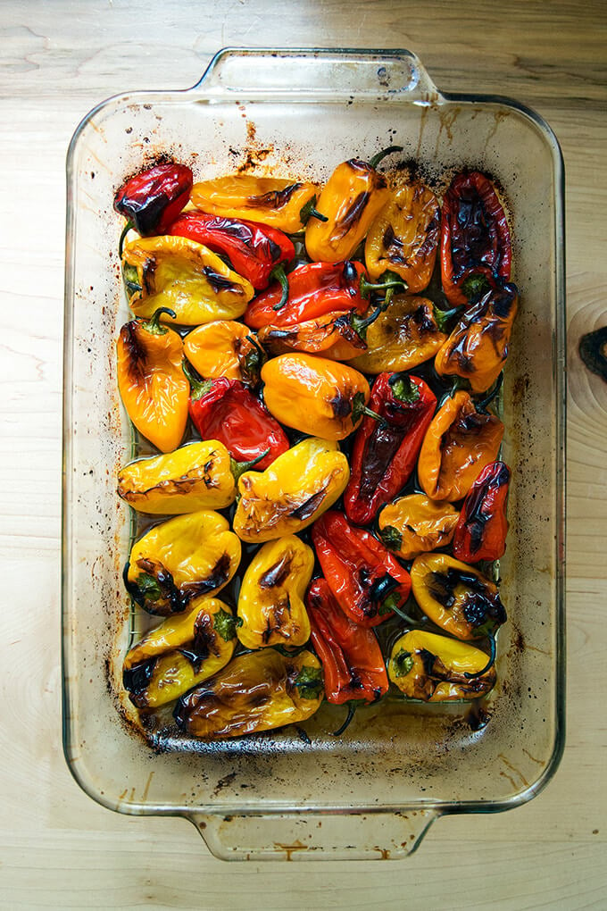 A 9x13-inch pan filled with just-roasted peppers.