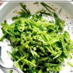A bowl of snap pea salad with buttermilk dressing.
