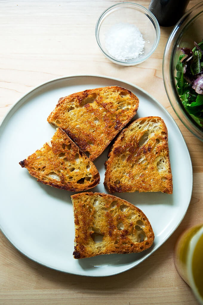 A plate of vinaigrette toasts.