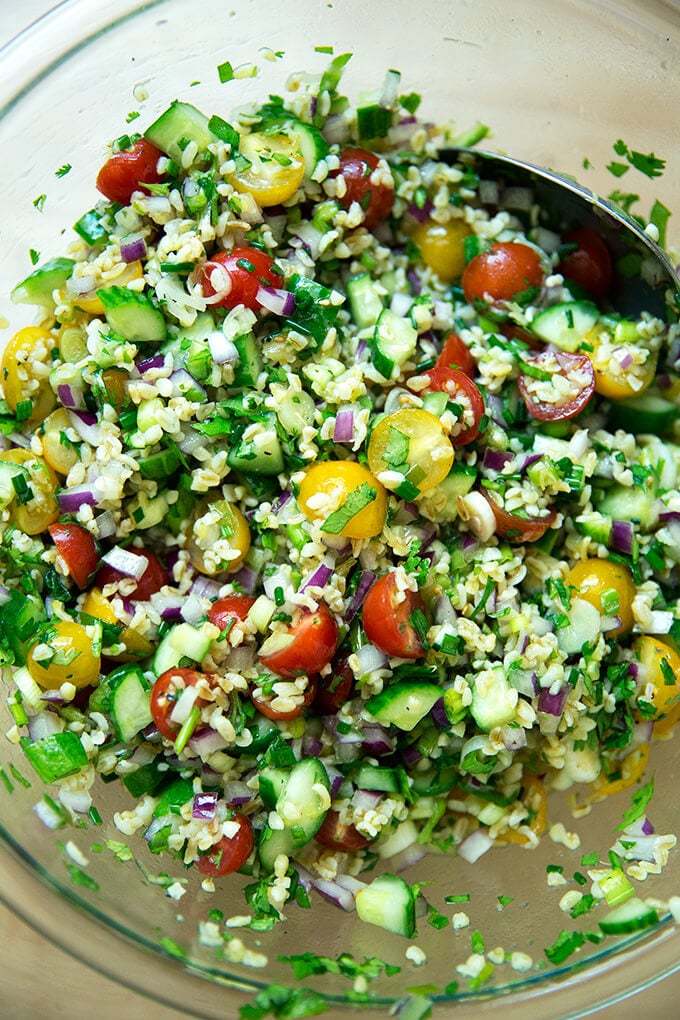 A bowl of tabbouleh all tossed together.