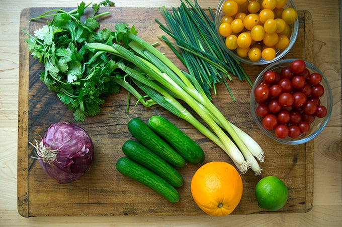 A board with ingredients for tabbouleh.