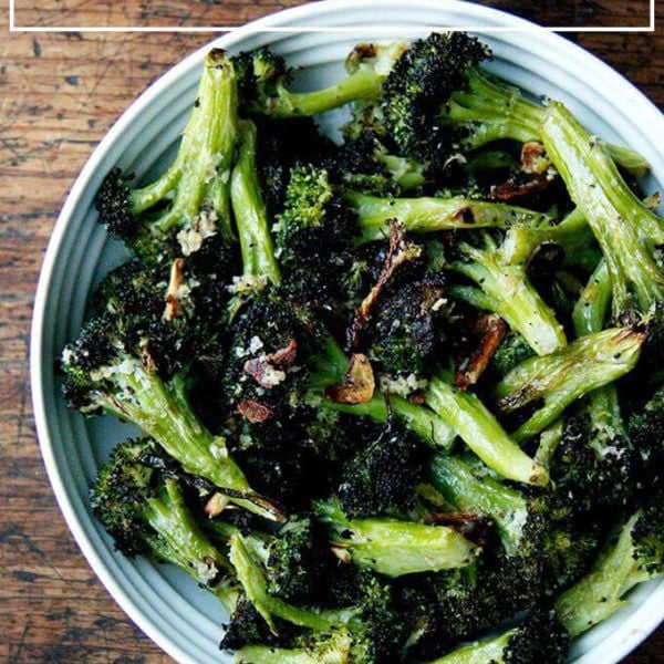 A bowl of roasted broccoli.