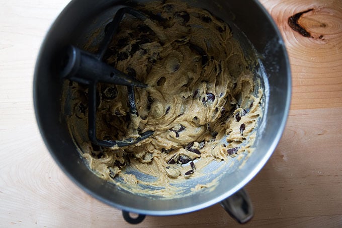 A stand mixer with gluten-free chocolate chip cookie batter.