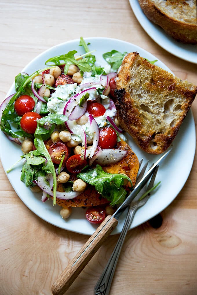 A plate of Israeli spiced tomato salad and bread.