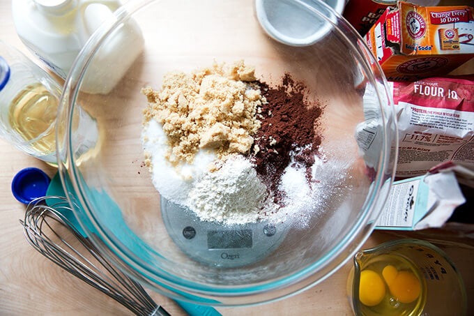 A large bowl filled with the dry ingredients to make one-bowl chocolate cupcakes.